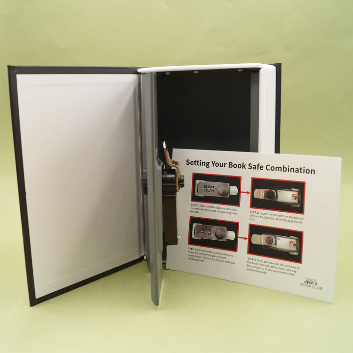 The book safe open and the instructions that are included within the safe (to set, default is 0-0-0)