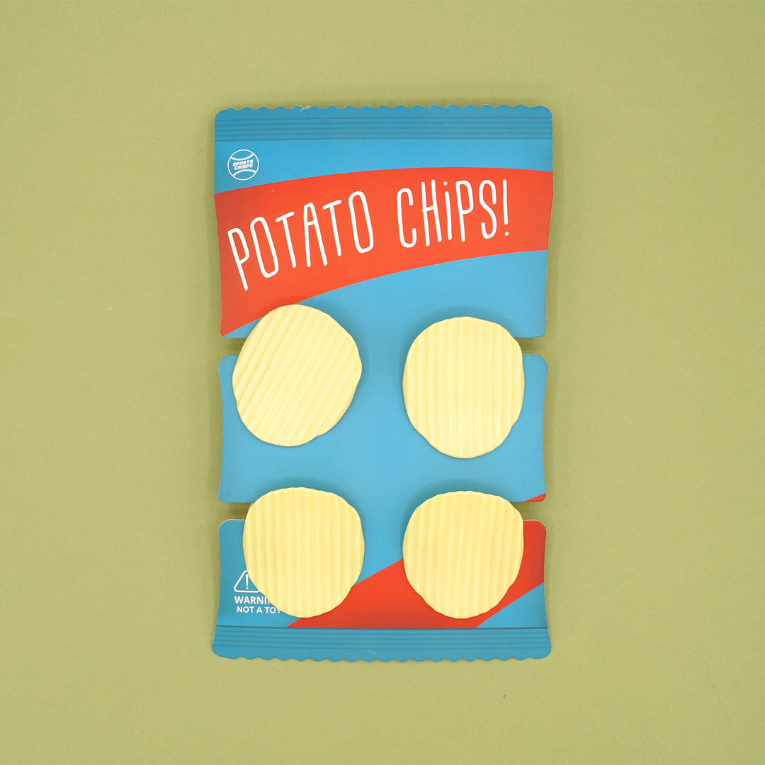 a set of four 'potato chip' looking chip clips on a card that looks like a bag of chips.