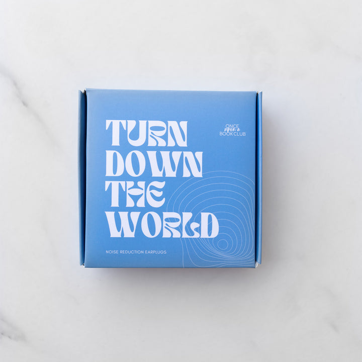 A blue box labeled Turn Down the World Noise Reduction Earplugs.