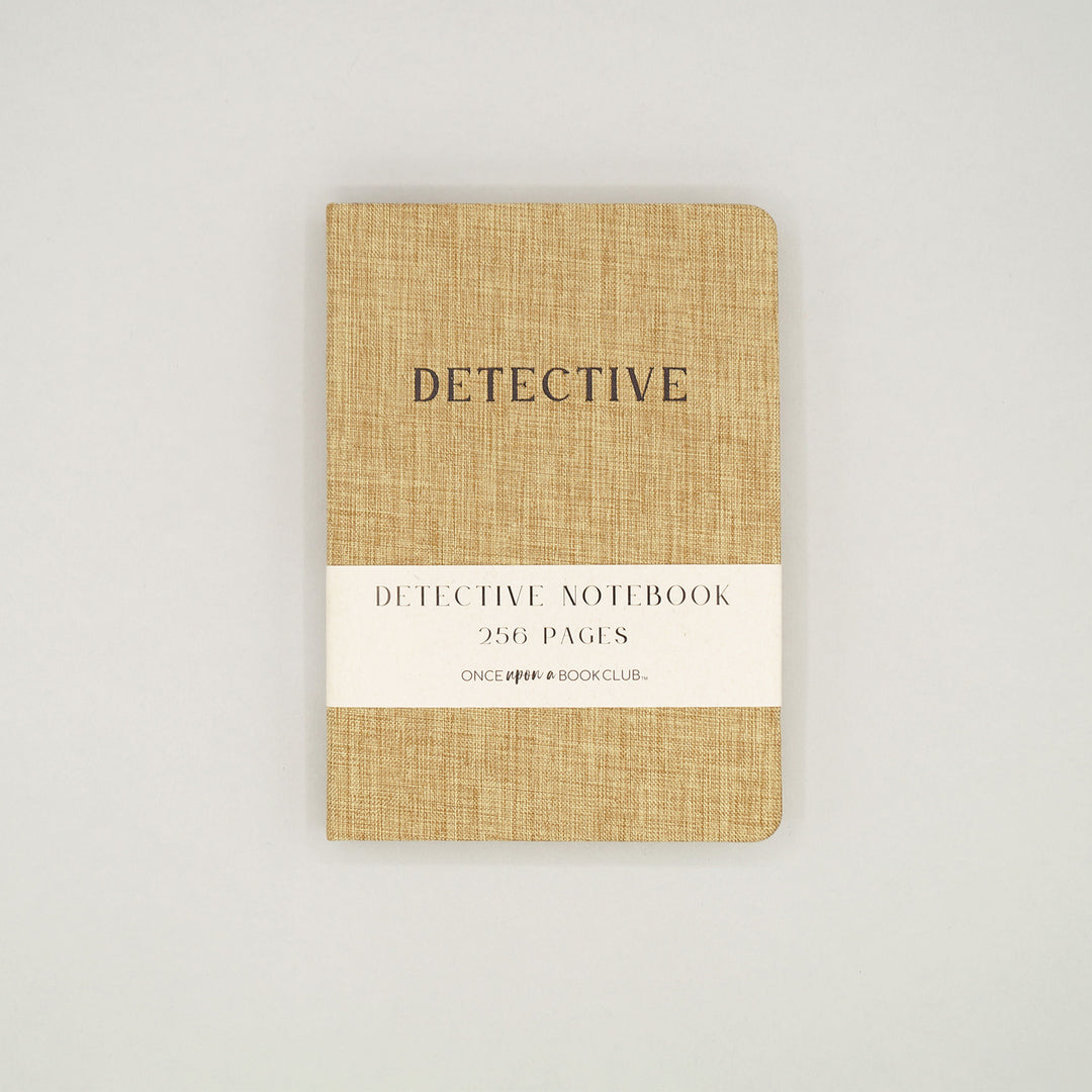 a 256 page, fabric-bound notebook that has the word "Detective" printed on the front cover.