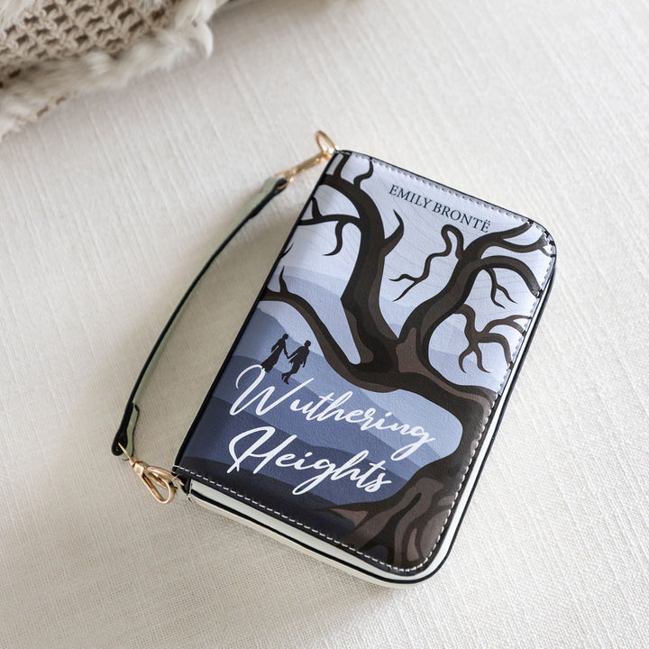 A book-shaped purse inspired by Wuthering Heights by Emily Brontë. The front cover of the purse is visible with the short handle attached.