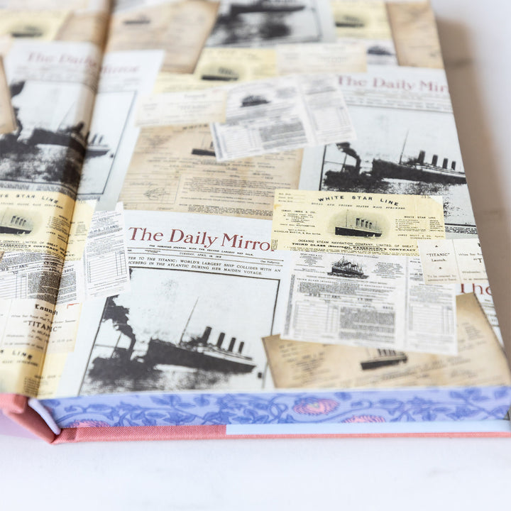 An exclusively designed hardcover copy of Sisters of Fortune by Anne Lee Huber as designed by the Once Upon a Book Club team. The custom end papers are designed with various notes and clippings featuring The Titanic from 1912.