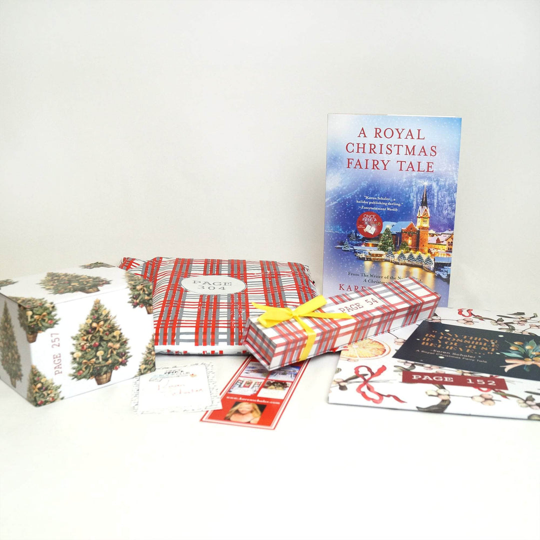 From left to right - a white box with Christmas tree pattern, signature card, red and white polybag, bookmark, white box, hardcover edition of A Royal Christmas Fairy Tale, white folder, and quote card.  The boxes, folder, and bag all have page numbers.